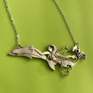 Wild Ride, a mermaid swimming with a dolphin, in sterling silver