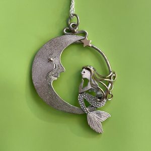 Sterling silver mermaid sitting on a moon necklace, this is Wish