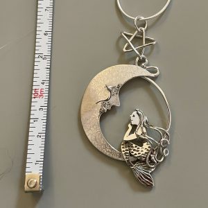 Sterling silver mermaid sitting on a moon necklace, this is Wish
