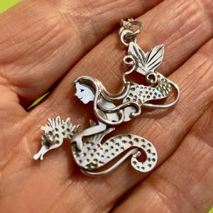 "On the Hunt" mermaid and seahorse in sterling silver, diving together