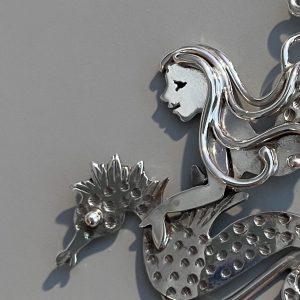 "On the Hunt" mermaid and seahorse in sterling silver, diving together