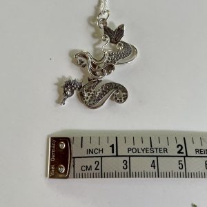 "On the Hunt" mermaid and seahorse in sterling silver, diving together