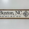 Buxton sign with GPS with compass