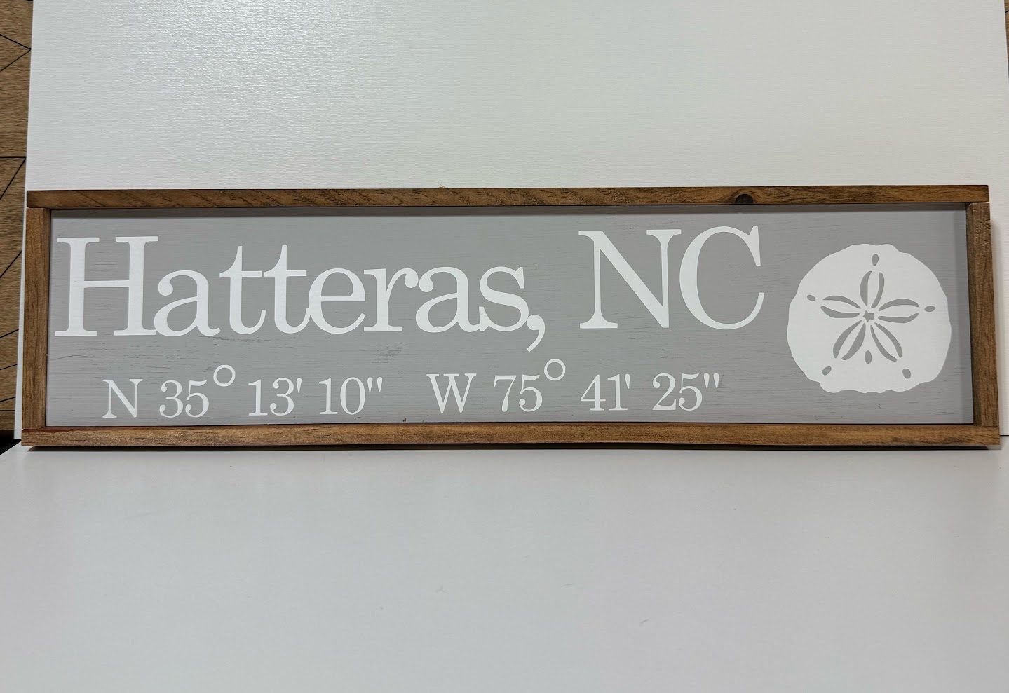 Hatteras GPS Sign with Sand dollar