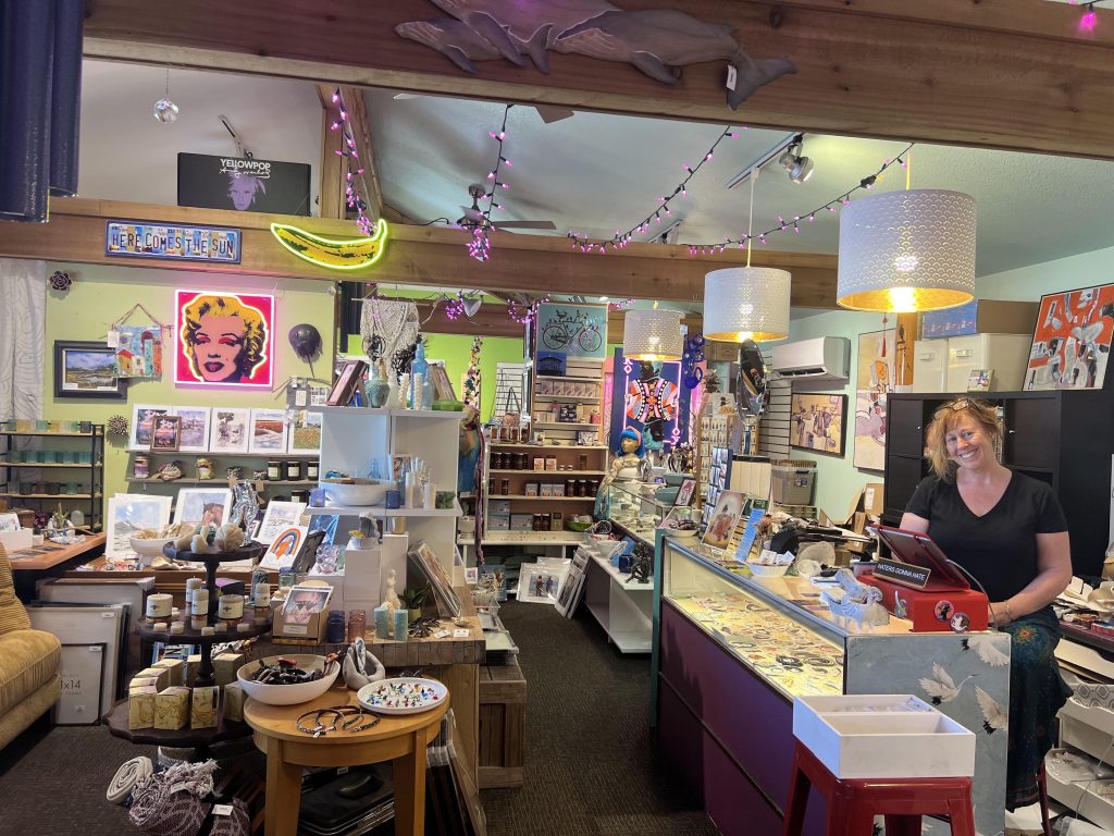 Swell Art Gallery Gifts in Buxton and owner April Trueblood. Photo courtesy of Dare Arts